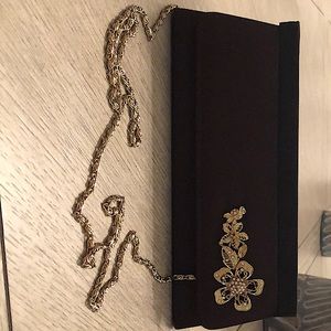 Flowered evening bag. Never worn in perfect condition.